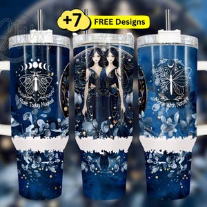 a set of three travel mugs with designs on them