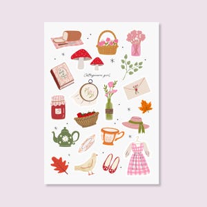 Puede incluir: Ilustración de estilo cottagecore con elementos como una cesta de picnic, setas, un libro, un tarro de mermelada, una tetera, una taza de té y un vestido. El texto "Cottagecore girl" está escrito en cursiva. Otros elementos son flores y un sombrero.