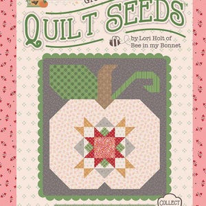 May include: A quilt pattern packet titled Autumn Quilt Seeds by Lori Holt of Bee in my Bonnet. The cover features a graphic of a pieced fabric pumpkin with a star center, set against a dark gray background, with the text Pumpkin No. 4.
