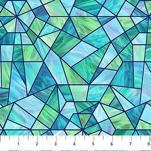 May include: Geometric fabric with a stained glass effect. The design features irregular shapes in shades of blue and green, outlined with dark blue lines. A ruler is at the bottom, showing measurements in inches.
