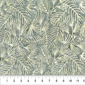 May include: Fabric featuring a repeating pattern of light yellow fern-like leaves on a mottled grey background. The leaves have a detailed, vein-like design. A ruler at the bottom shows measurements in inches.