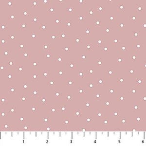 May include: Dusty rose fabric with a scattered white polka dot pattern. The fabric is shown with a ruler along the bottom edge, with measurements up to 6 inches.