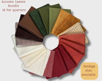 May include: A bundle of 18 fat quarters in autumn colors, arranged in a circular pattern. The fabrics include various textures and patterns, such as polka dots, stripes, and checks, in shades of brown, green, orange, and red. Text reads "Autumn Leaves Bundle".