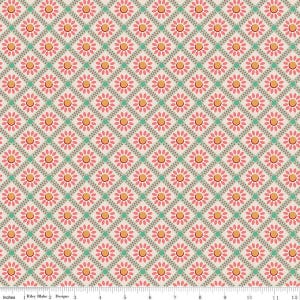 May include: A repeating pattern of pink flowers with orange centers, set within a diamond grid. The diamonds are outlined with a zig-zag pattern in a light green color. The background is a light beige color. The image includes a ruler with inches.