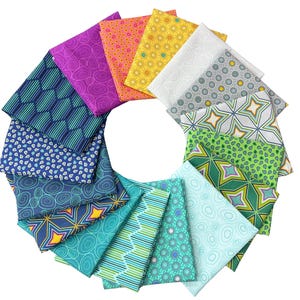 May include: A circular display of patterned fabric squares in a variety of colours. The fabrics feature geometric, floral, and abstract designs. The colour palette includes blues, greens, pinks, oranges, and yellows. The squares are neatly folded and arranged in a fan shape.