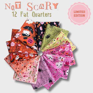 May include: A set of 12 fat quarters of fabric arranged in a circular fan pattern. The fabric features various Halloween-themed prints including ghosts, bats, spiders, webs, pumpkins, and candy in orange, black, pink, and lime green colors. Text reads NOT SCARY 12 Fat Quarters and LIMITED EDITION.