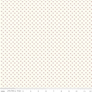 May include: Cream-colored fabric with a repeating pattern of small, red cross-shaped designs. The fabric has a smooth texture and is suitable for quilting or other craft projects. The pattern is evenly spaced across the surface.