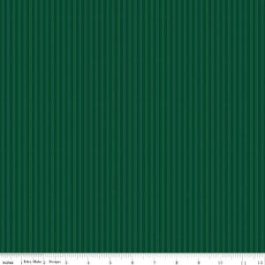 May include: A fabric with a vertical striped pattern in shades of green. The fabric has a textured appearance, with darker green stripes alternating with lighter green stripes. The image includes a ruler with inches.