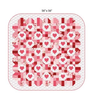 May include: A pink and red quilt with a heart pattern, measuring 56" x 56". The quilt features a patchwork design with heart-shaped accents. The text "Sew Smitten" and "My Sew Quilty Life" are also visible.