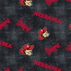 Sykel Enterprises - Nebraska Cornhuskers Tossed on Distressed FLANNEL by the yard 2860