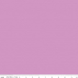 May include: A close-up of a fabric with a small, repeating dot pattern in a light purple color. The fabric is measured in inches along the bottom edge.