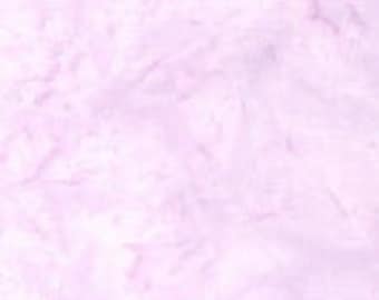 May include: A light purple textured background with a subtle marbled effect.