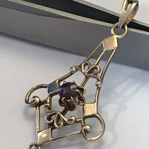 Edwardian 9 carat gold pendant with amethyst