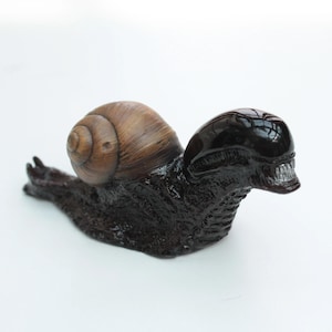 Alien snail tabletop figure