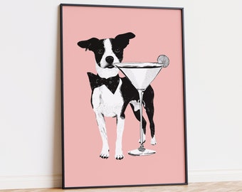 May include: A black and white dog wearing a black bow tie stands in front of a martini glass with a lime wedge on a pink background.