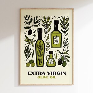 May include: A framed illustration of olive oil bottles and branches of olive trees. The text "EXTRA VIRGIN OLIVE OIL" is printed below the image.