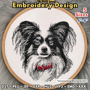 May include: An embroidery design of a Papillon dog face in black and white thread, featuring a red collar, centered in a wooden hoop. Text includes Embroidery Design, 5 Sizes 4-8, and file formats like DST, PES, JEF, EXP, HUS, VP3, EMD, XXX.