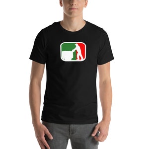 May include: Black t-shirt featuring a graphic of a person pushing a cart, with a red, white, and green design inside a white-bordered rectangle. The shirt is made of a soft, comfortable material.