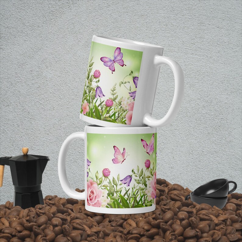 Butterflies In A Flower Garden In Watercolor White glossy mug