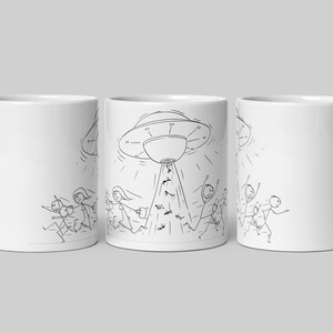 May include: White ceramic mug featuring a black and white cartoon illustration of a UFO abducting stick figures. The design shows people running away from the spaceship. A fun and quirky design for coffee or tea.