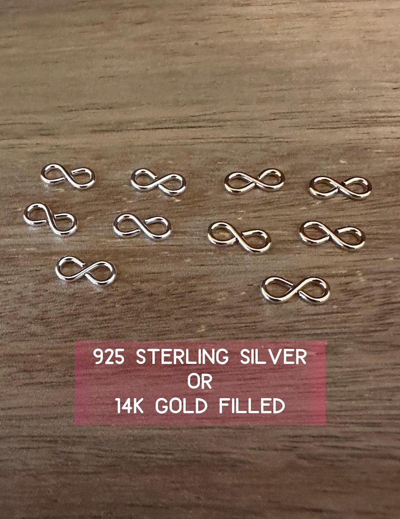 May include: Ten silver infinity symbol charms, 925 Sterling Silver or 14k Gold Filled.