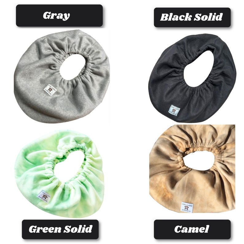 May include: Four circular fabric covers with elasticized centers, labeled Gray, Black Solid, Green Solid, and Camel. Each cover features a small white rectangular brand tag. The fabric textures appear soft and gathered around the central opening.
