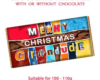 May include: A colorful chocolate bar wrapper with the text "Merry Christmas Grandude" on it. The wrapper is suitable for a 100-110g chocolate bar.