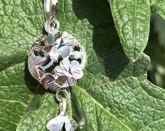 Colgante de flor de plata de ley
