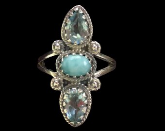 Anillo de larimar y topacio azul