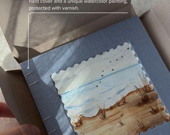 Handgemaakt dagboek met zeethema: schetsboek met linnen koptische steken