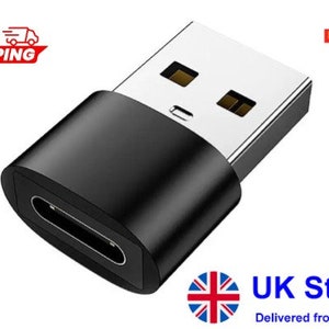 May include: A black USB-C to USB-A adapter. The adapter has a black plastic housing and a silver metal connector. The adapter is designed to connect a USB-C device to a USB-A port.