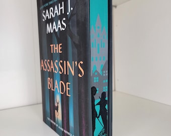 Libro "La Espada del Asesino" con bordes pintados, bordes con plantilla, pintura en el canto, libros de edición especial, decoración literaria, bordes pintados a medida.