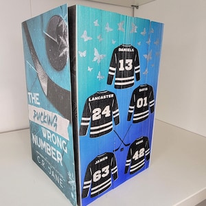 The Pucking Wrong Series sprayed edges book, stenciled edges, special edition book, book merch, fore edge painting, dark romance