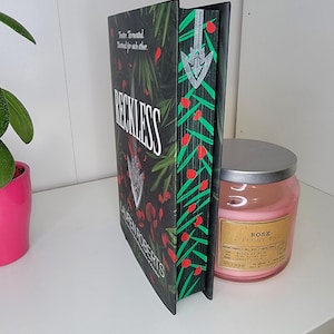 Reckless by Lauren Roberts with sprayed edges book, stenciled edges, painted book edges, special edition book, book merch, custom book