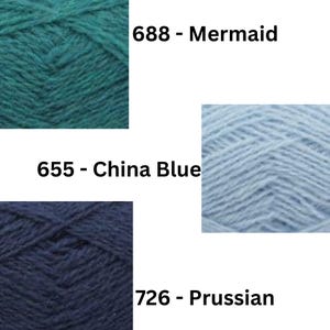 May include: Three skeins of yarn in different shades of blue. The skeins are labeled with their color names and numbers: 688 - Mermaid, 655 - China Blue, and 726 - Prussian.