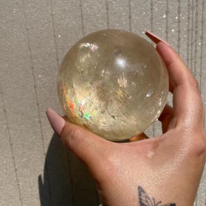 Gorgeous rainbow filled honey calcite