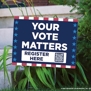 May include: A rectangular yard sign with a dark blue background, white text reading YOUR VOTE MATTERS, and a white rectangular box containing the text REGISTER HERE next to a QR code. The sign features red and white stripes and blue stars.