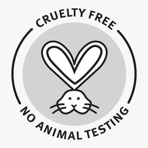 May include: A circular gray and black Cruelty Free, No Animal Testing logo. The logo features a heart shape above a rabbit's head. The words "CRUELTY FREE" and "NO ANIMAL TESTING" are in a circular pattern around the logo.