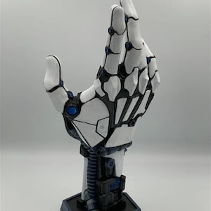 Futuristic Robot Hand Console Controller Holder - Sci-Fi Gaming Setup Companion