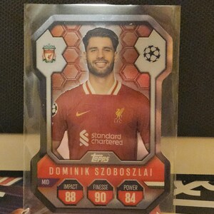 Dominik Szoboszlai « Chrome Pro Elite Shield », nouveau Topps Match Attax 2024/2025. Carte de football. Carte à collectionner. Expédition combinée. Lisez les informations.