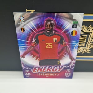 Jeremy Doku « Energy », Topps Match Attax Euro 2024. Belgique. Carte de football. Carte à collectionner. Expédition combinée. Lisez les informations.