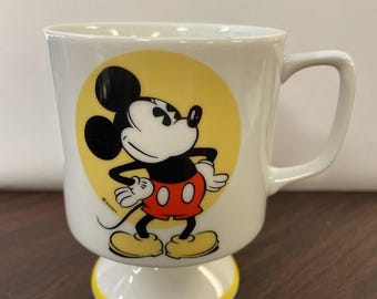 Taza de café con pedestal de Mickey Mouse de Walt Disney, vintage, años 70, amarilla
