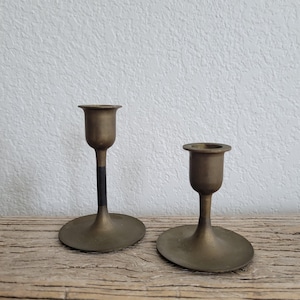Vintage solid brass pair of simple candlestick holders