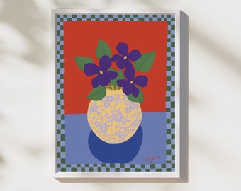 May include: A framed illustration of a yellow vase with purple flowers against a red background with a blue and green checkered border.