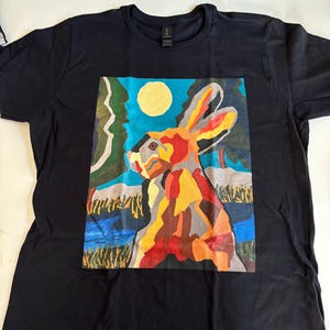 T shirt with Rabbit looking at Moon graphic