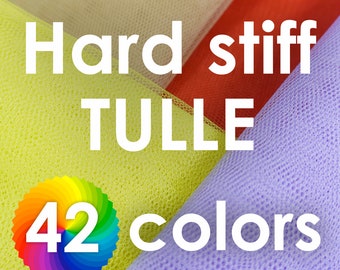 May include: Hard stiff tulle fabric in a variety of colours. The tulle is shown in yellow, red, and purple. The text "Hard stiff tulle 42 colours" is displayed on the image.