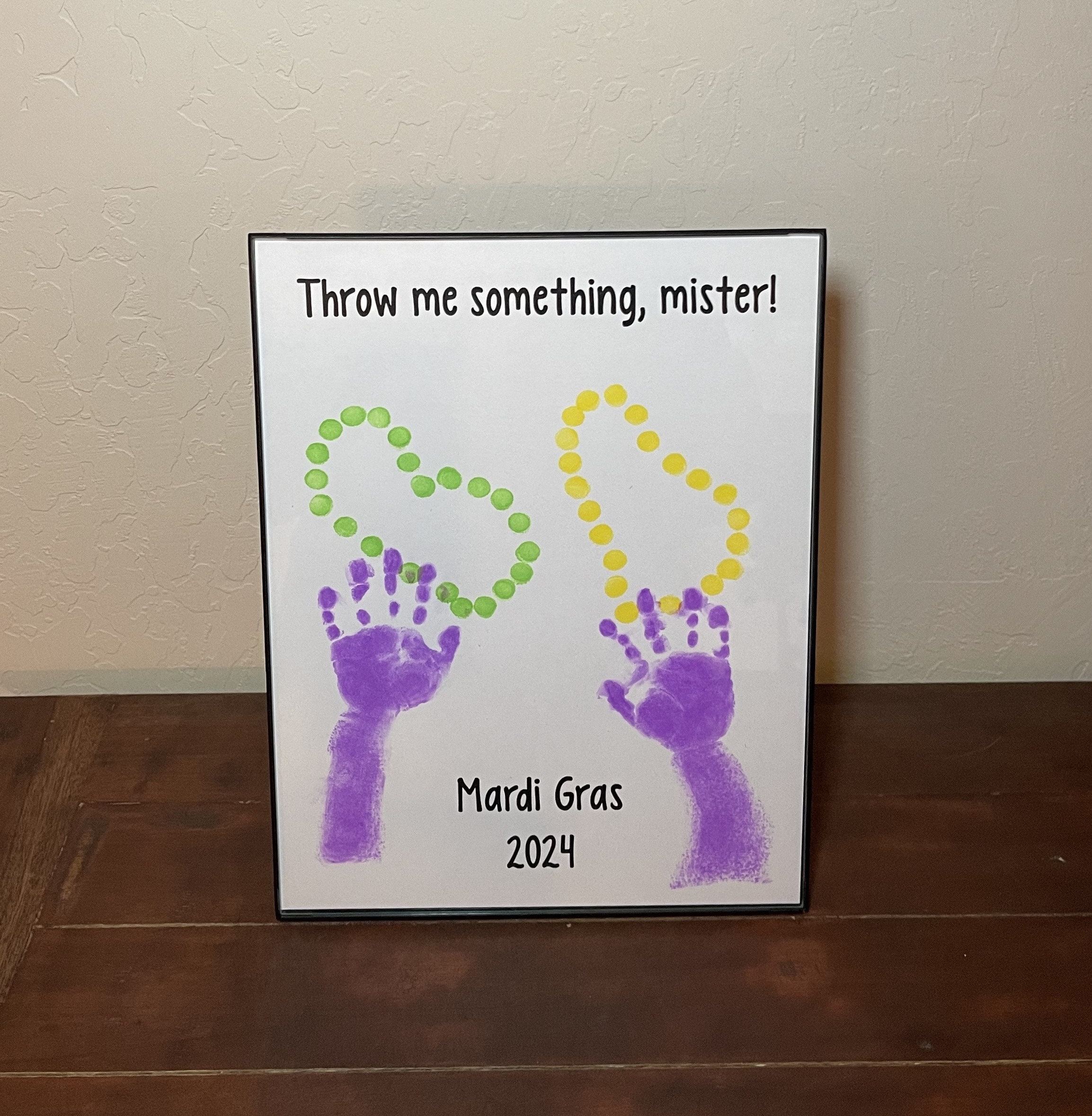 mardi gras handprint art