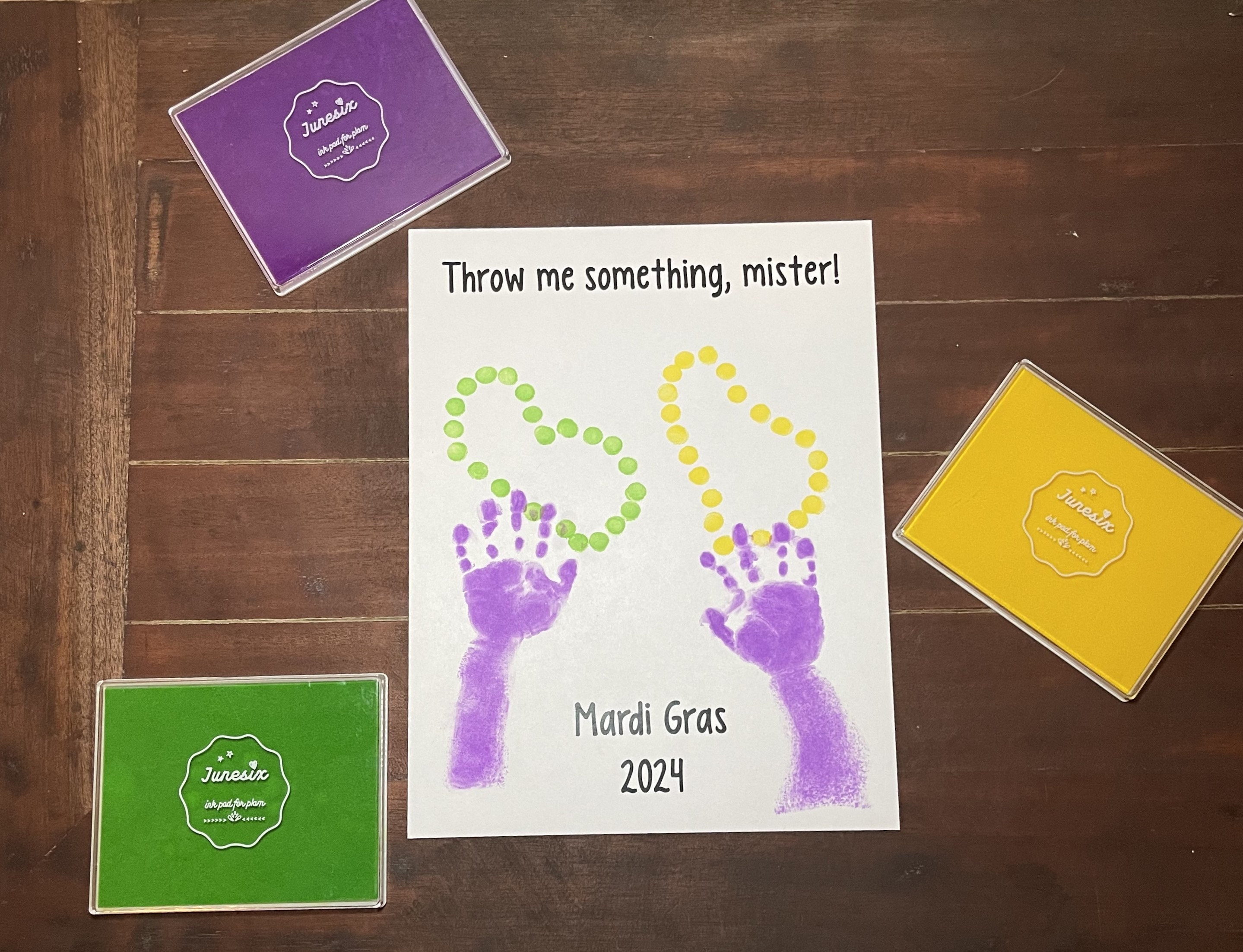 mardi gras handprint art