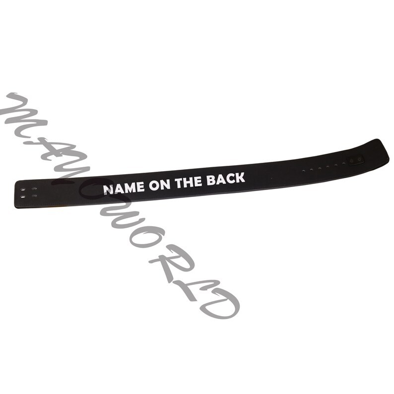 May include: Black weightlifting belt with white text that reads "NAME ON THE BACK".
