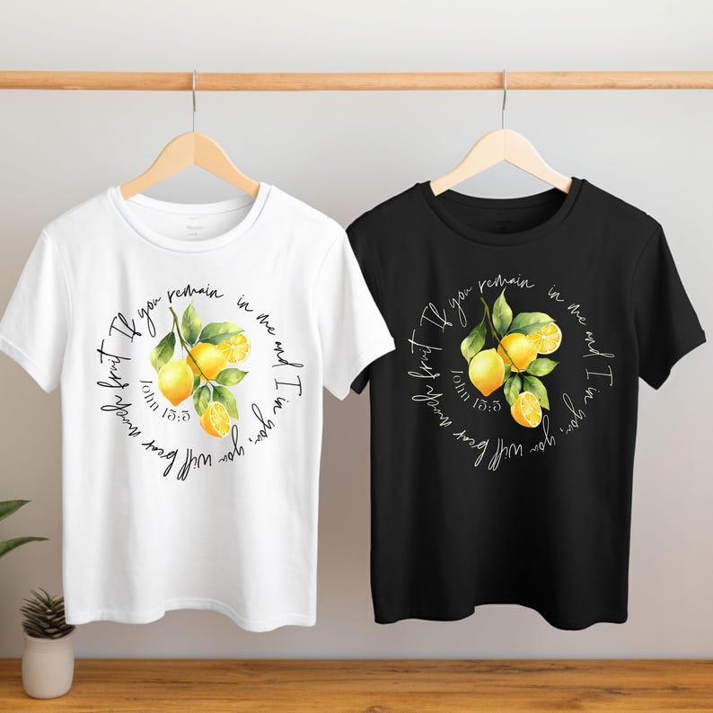 May include: Two t-shirts with a lemon design and the text "If you remain in me and I in you, you will bear much fruit." John 15:5.